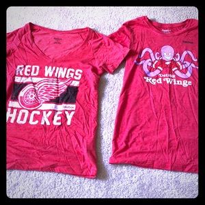 Two Reebok red wings shirts